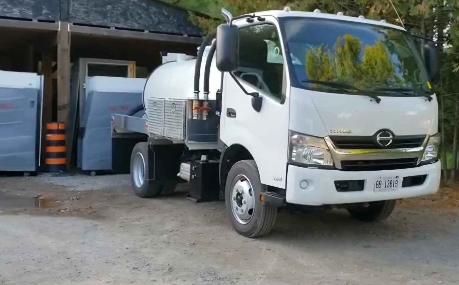 Gee Wizz vacuum service truck